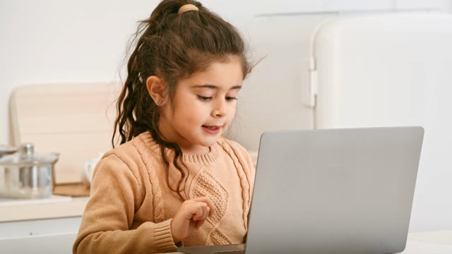 Little Girl Computer Stock Footage: Royalty-Free Video Clips - Storyblocks