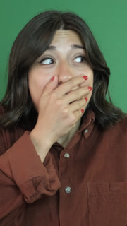 Woman with shocked facial expression, young girl smiling with surprise, facial expression of young woman in front