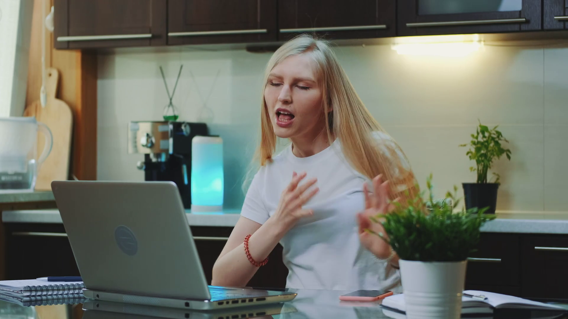 Cheerful Woman Singing And Gesturing While Looking On The Computer Screen She Spending Her Free Time In The Kitchen Stock Video Footage Storyblocks