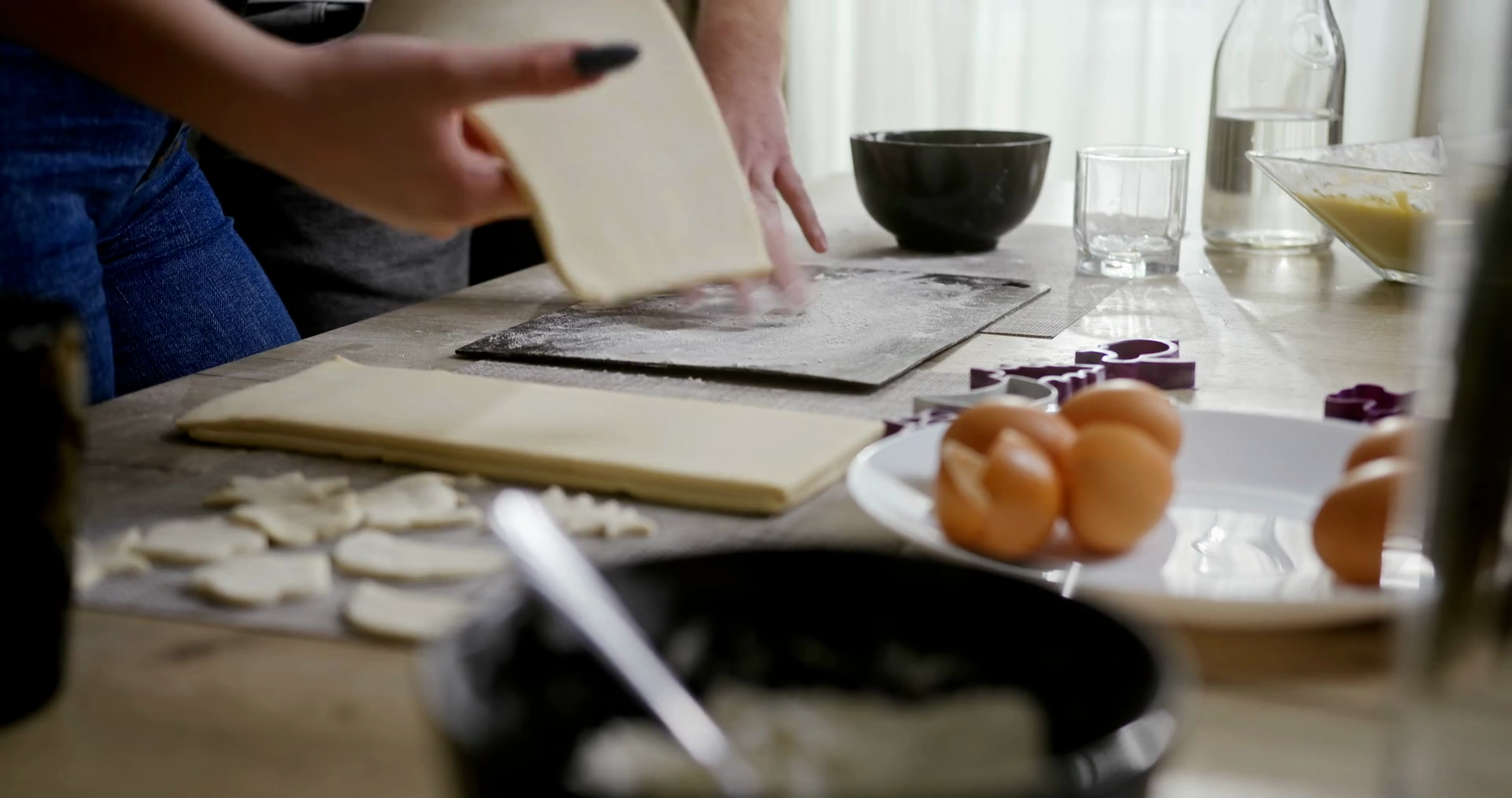 Young Couple Making Cookies In Kitchen Using Stock Footage SBV347613114 Storyblocks