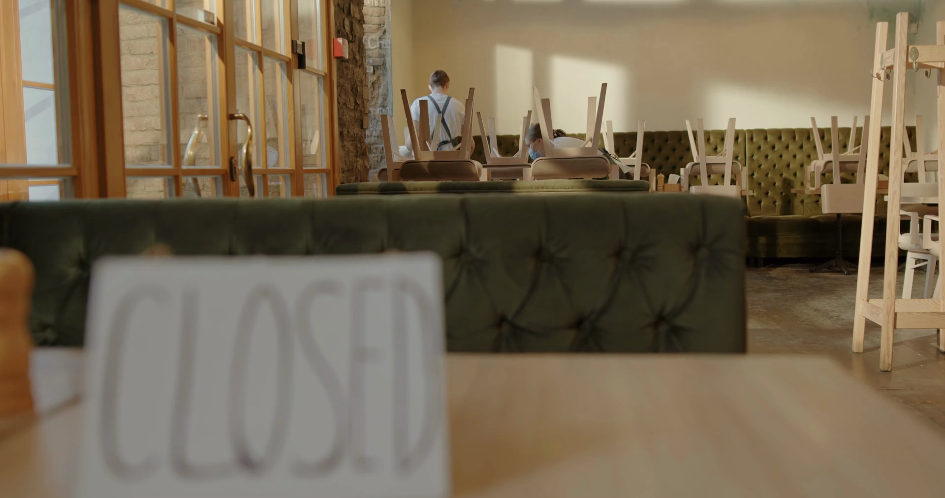 A Sign Stands Closed On Table Of Restaurant Stock Footage SBV348516244