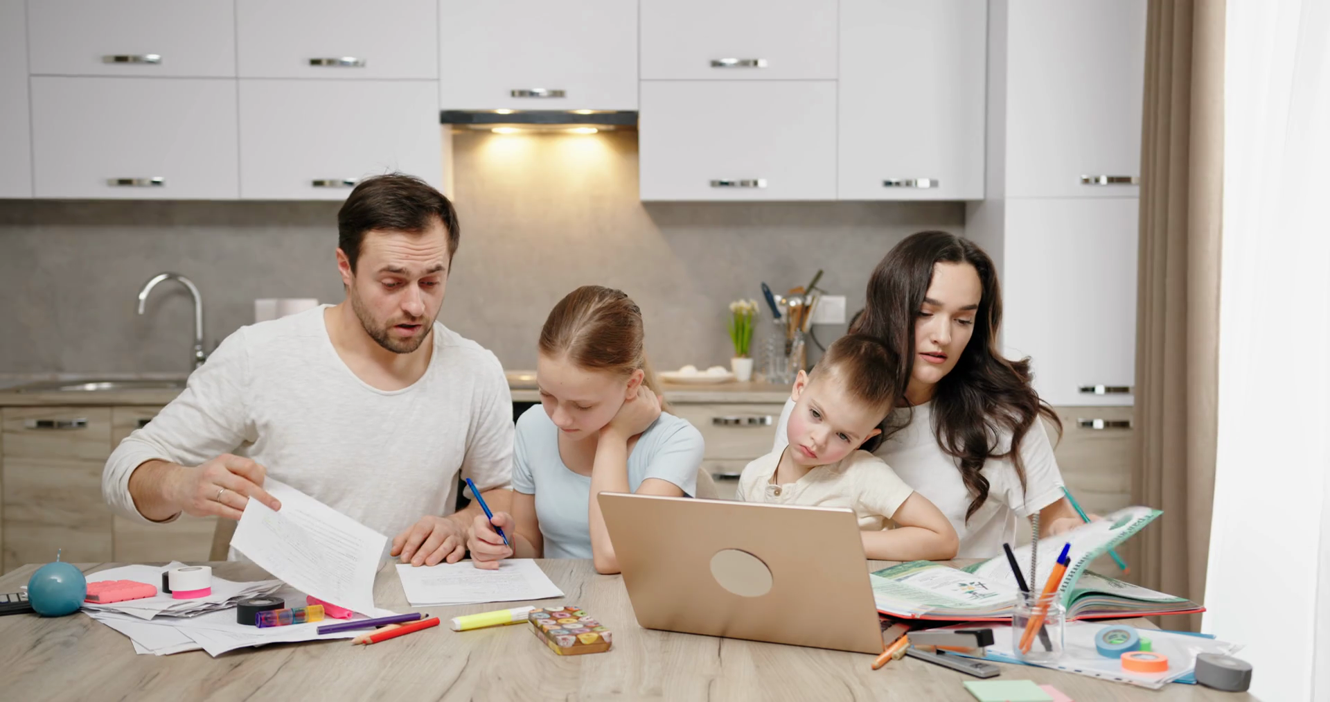 Tired Parents Help Children Do Homework At Stock Footage SBV-348542755 ...