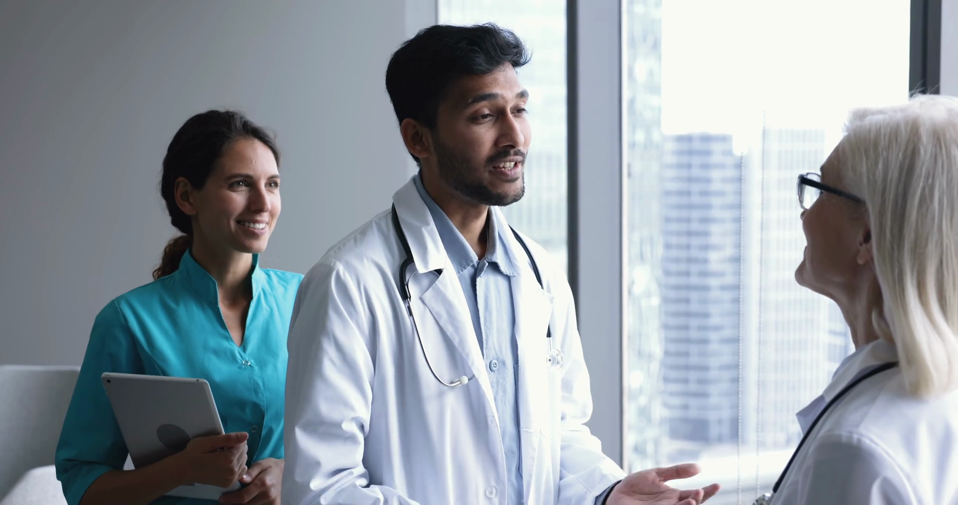 Happy Younger Medical Colleagues Shaking Stock Footage SBV-348761354 ...