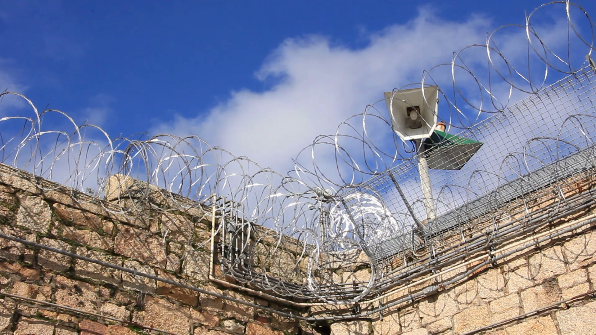 Prison Jail Gaol razor wire and security Stock Video Footage Storyblocks