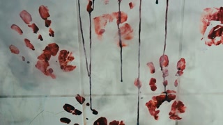 Bloody Handprints Appear on the Ceramic Wall of the Bathroom