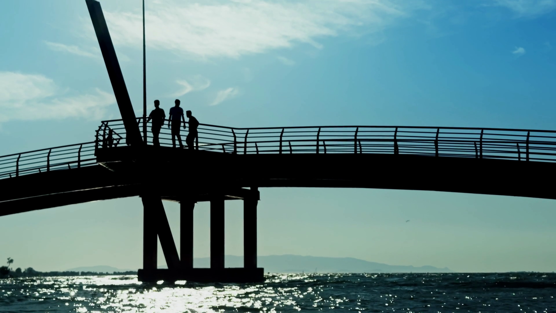 People Silhouette Crossing Bridge Over Sea Stock Footage SBV-352238455 ...