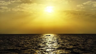 Boat on Sea at Sunset 