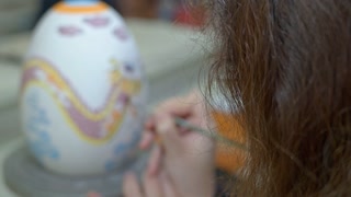 Working In A Ceramic Art Workshop Painting Huge Easter Paschal Eggs 1