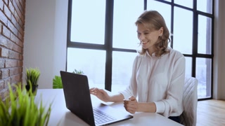businesswoman using webcam for call