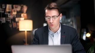 Business Man Talking On Video Conference Online In Office. Handsome Worker Having Video Call On Laptop Computer Indoor. Male Professional