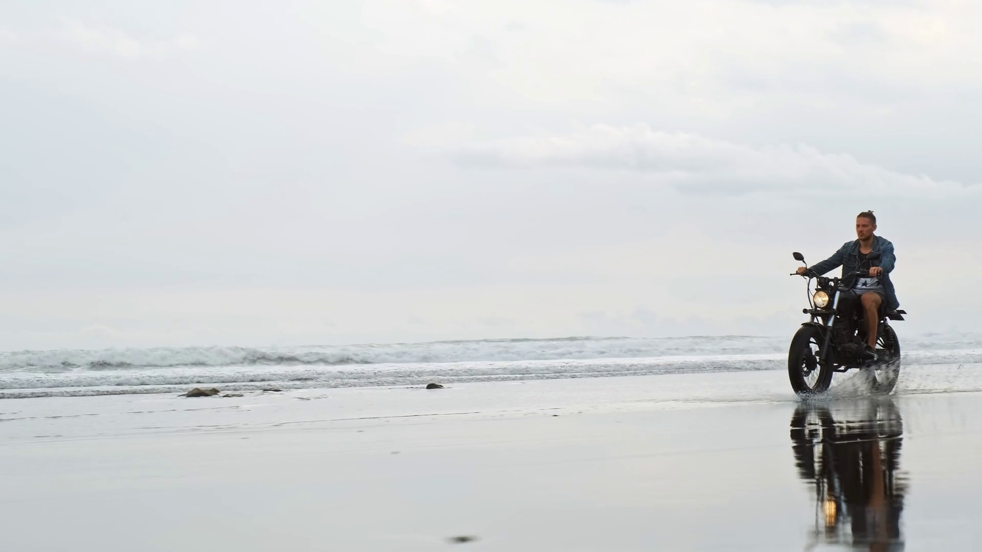 Man In Riding Motorcycle On Beach Vintage Motorbike On Beach