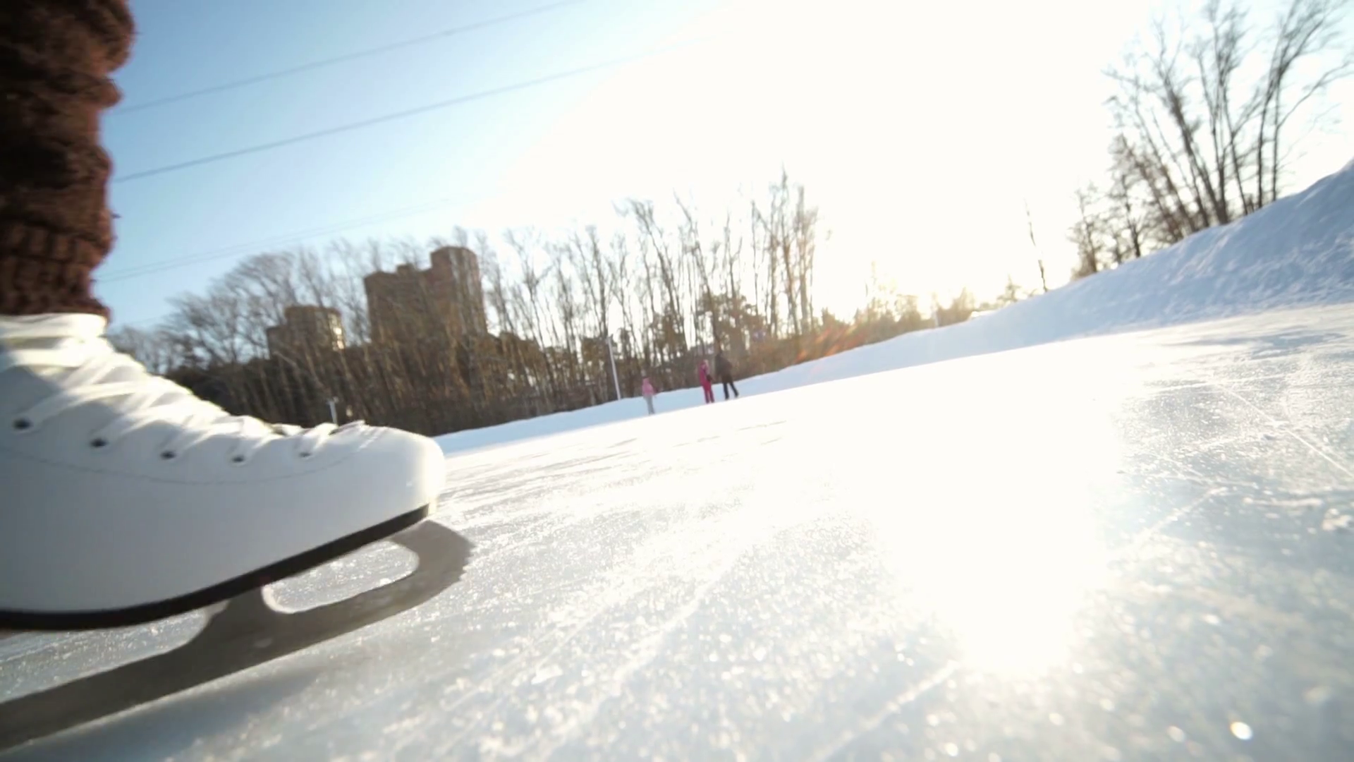 Young woman skating on ice with figure skates outdoors in the snow Stock Video Footage 0011 SBV