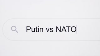 Searching for Putin vs NATO on the Internet. Putin vs NATO - Internet browser search bar question typing text with camera movement