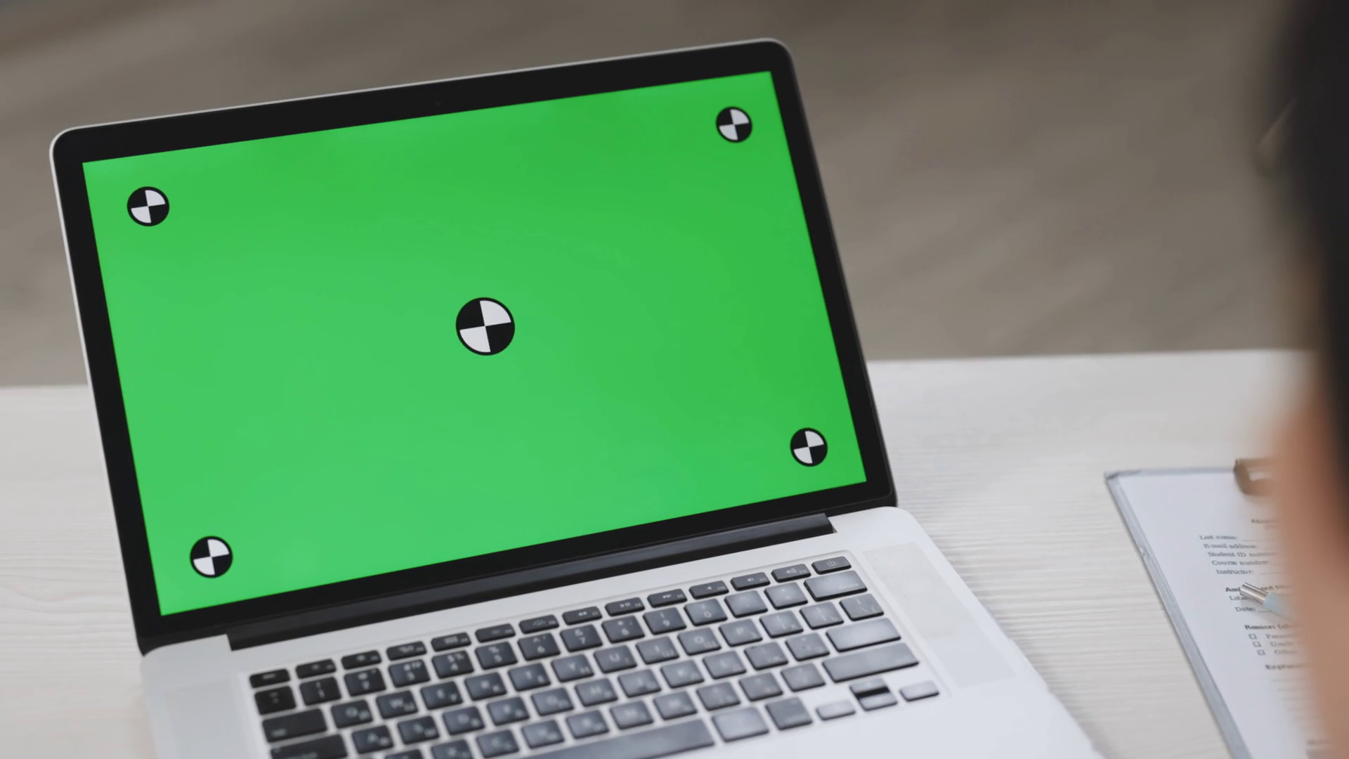 Back view of businessman look green screen laptop in office. Close up