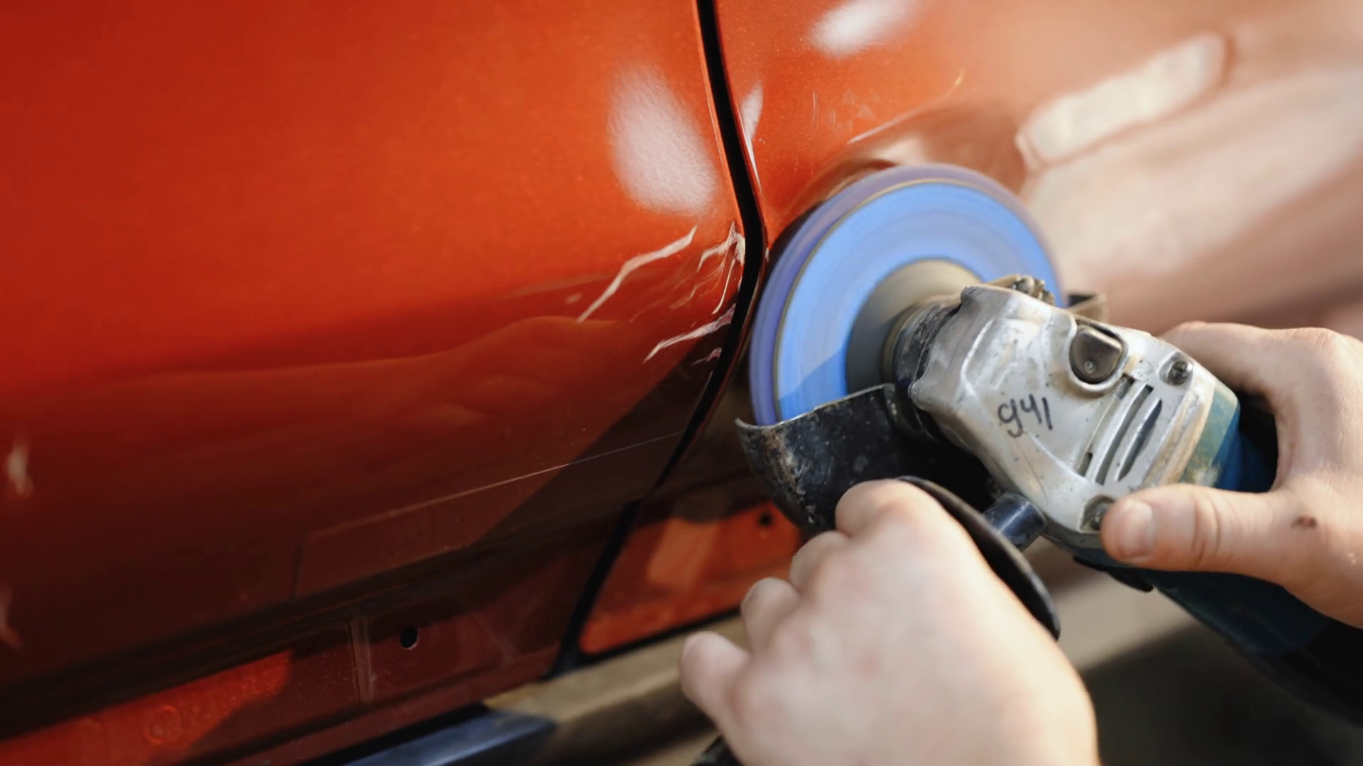 Car body panel repairing on the garage, car door panel dent removing