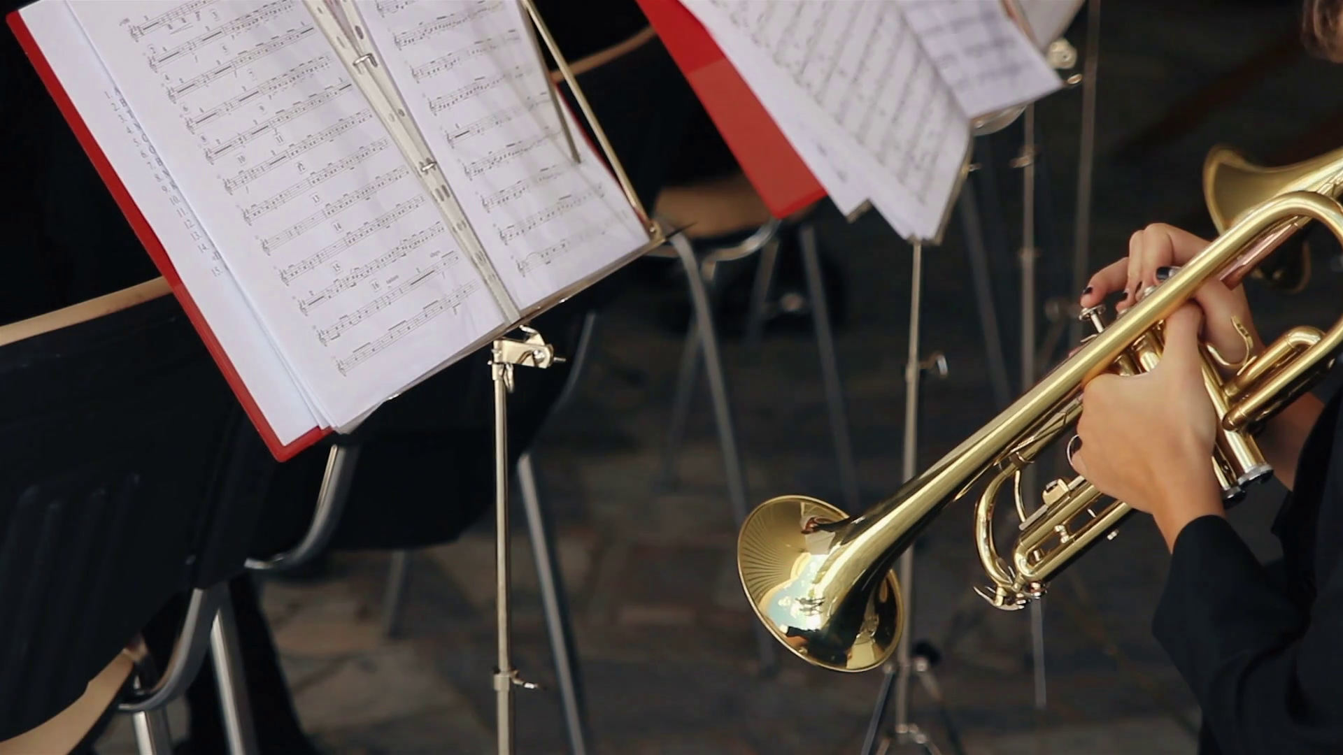 Young guys play on wind instrument in orchestra Stock Video Footage 00