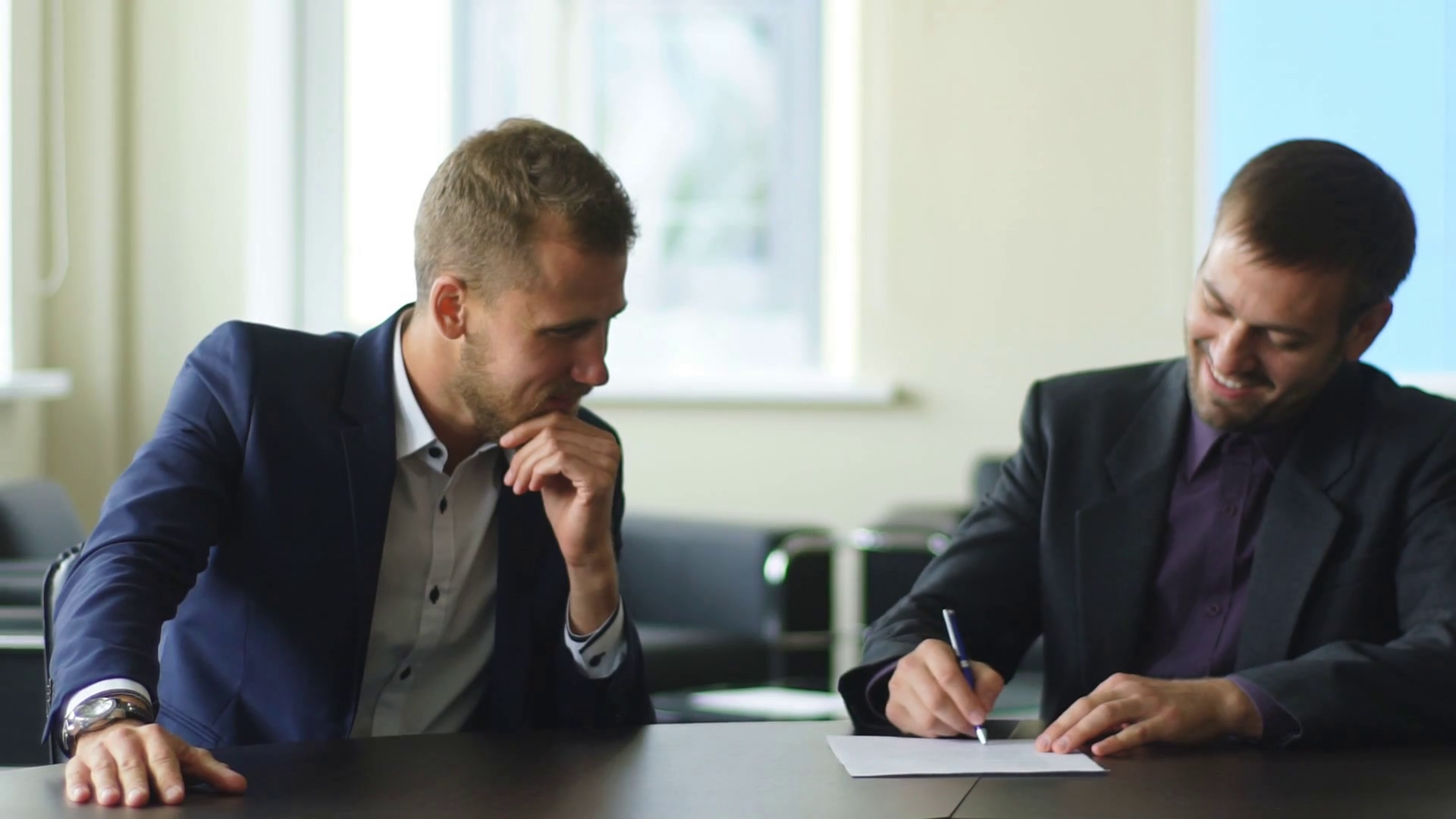 Close-up of two men handshaking after making agreement Stock Video