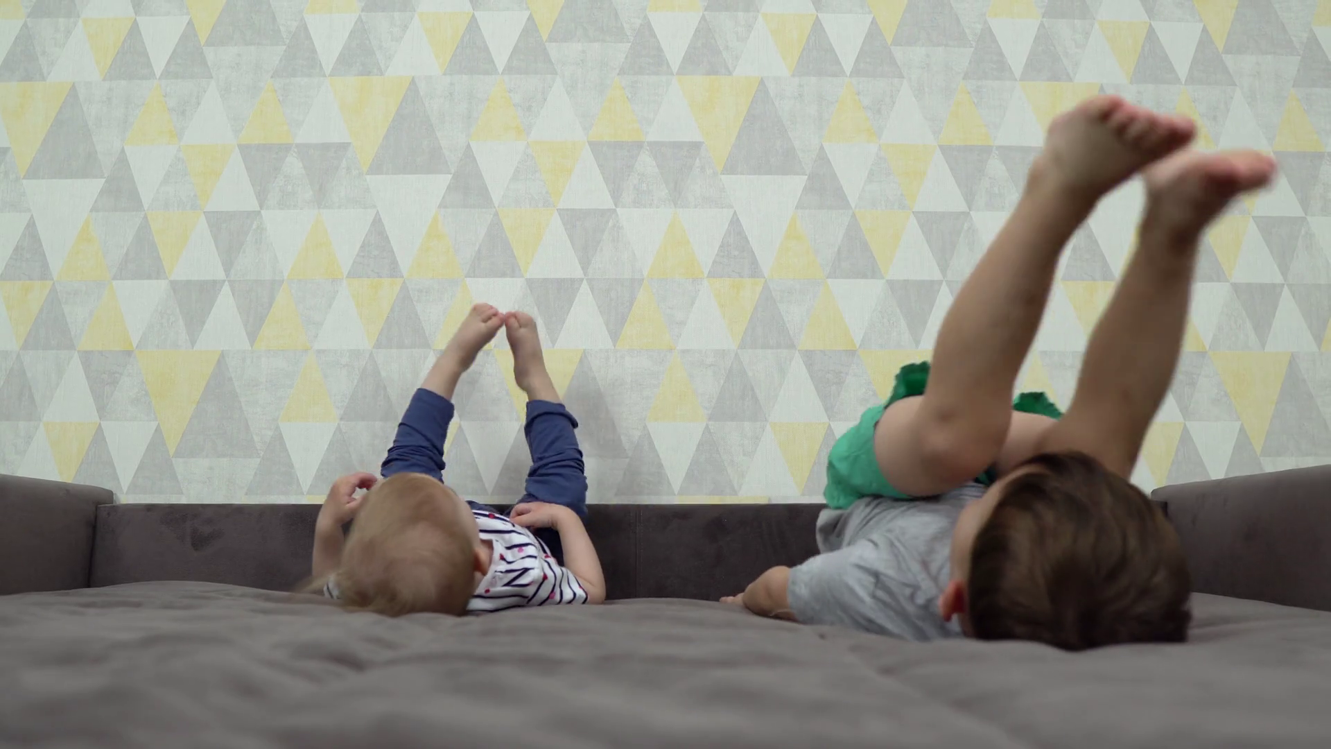 two children are lying on the bed upside down Stock Video Footage 0013 SBV338362595 Storyblocks
