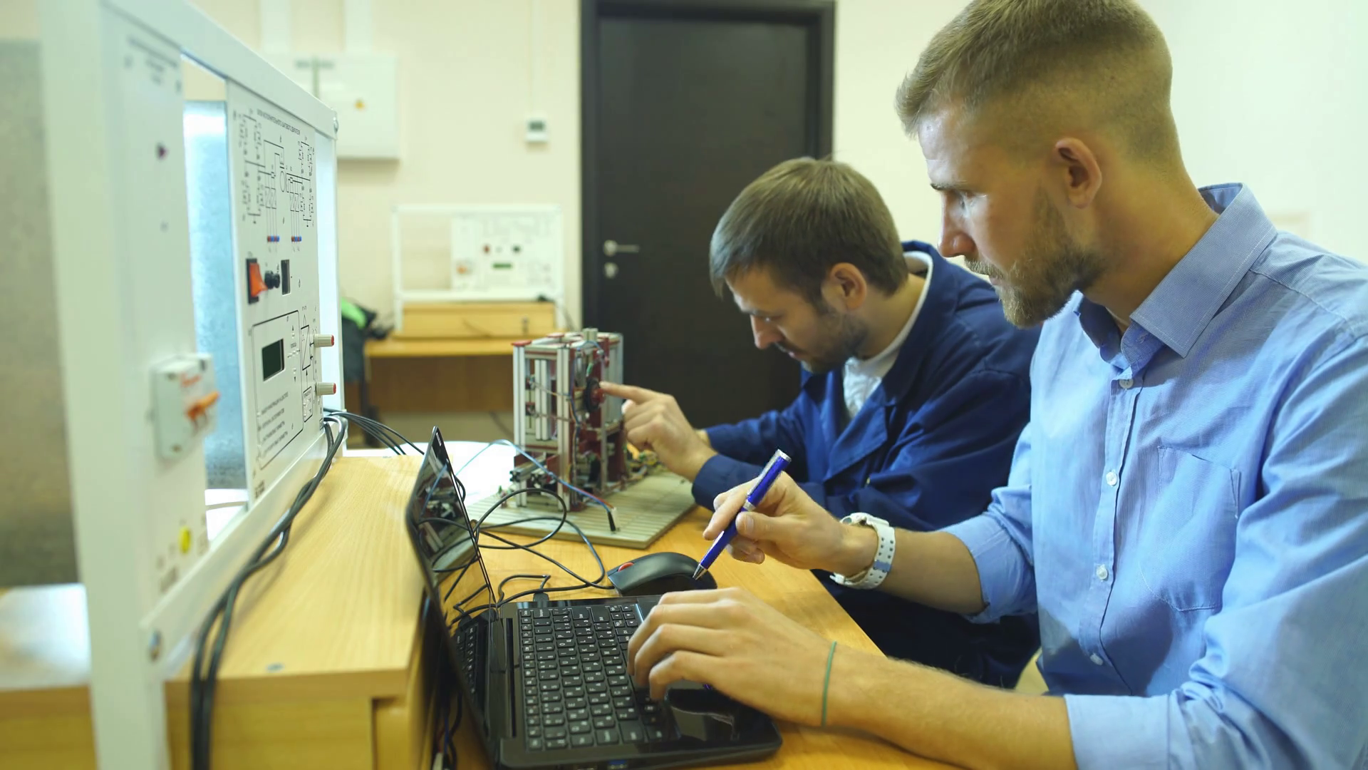 Young Engineers Working In Laboratory Using Stock Footage SBV311542109 Storyblocks