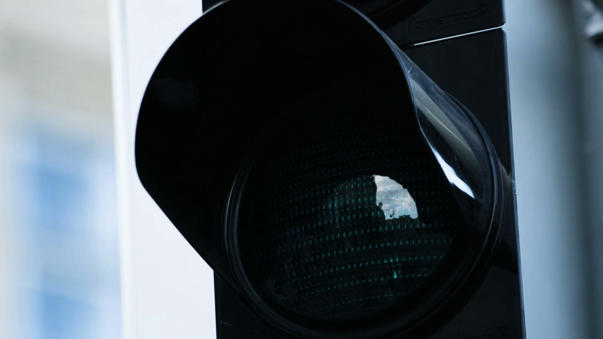 Closeup of traffic light turn green at the daytime. Picture of