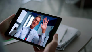 Business lady calling tablet online to man manager at office table closeup. Busy businesswoman have work video meeting using pad computer