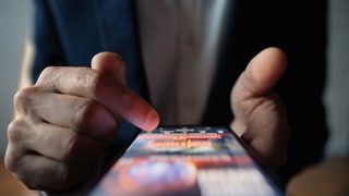 Fingers moving mobile display checking social media feed indoors closeup. Unrecognizable businessman exploring news reading internet. Office
