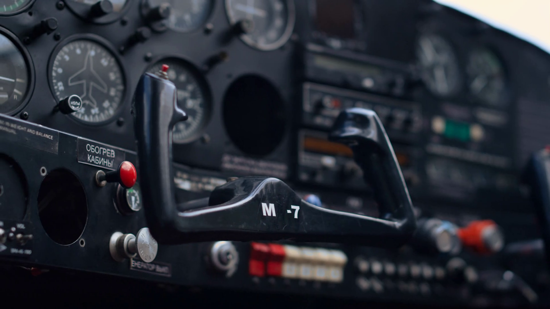 Modern airplane steering wheel inside small private aircraft cockpit