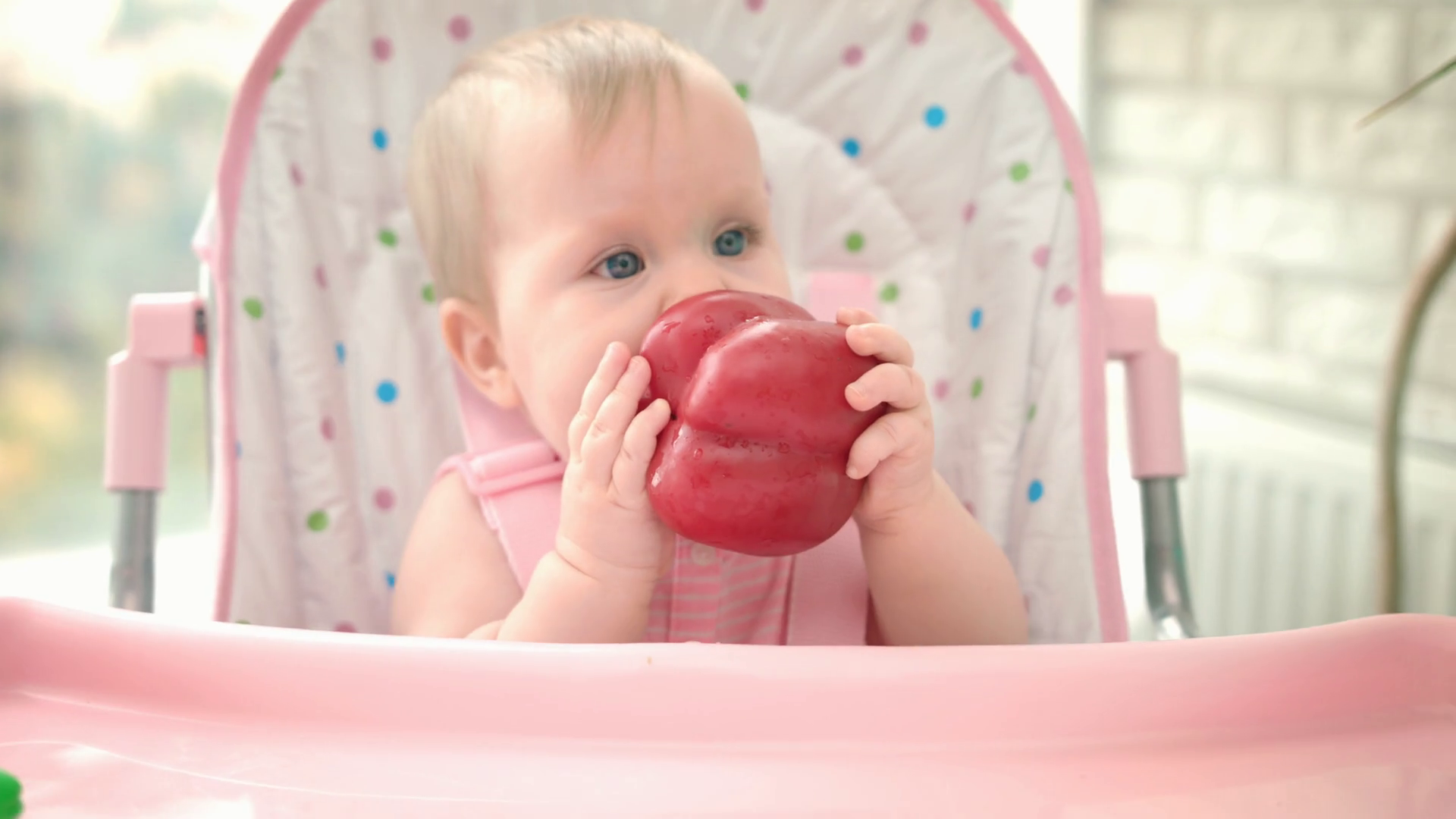 Adorable Baby Eating Red Pepper Close Up Of Stock Footage SBV323596272