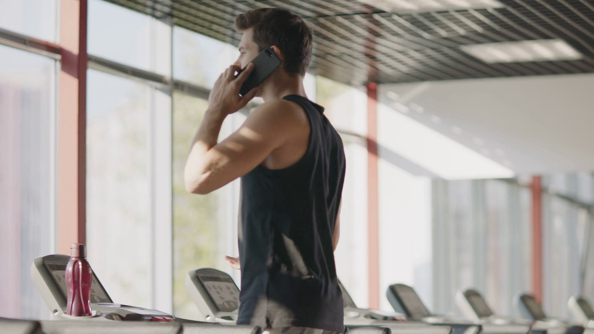 Fitness Enthusiast Using Cellphone On Stock Footage SBV337324878 Storyblocks