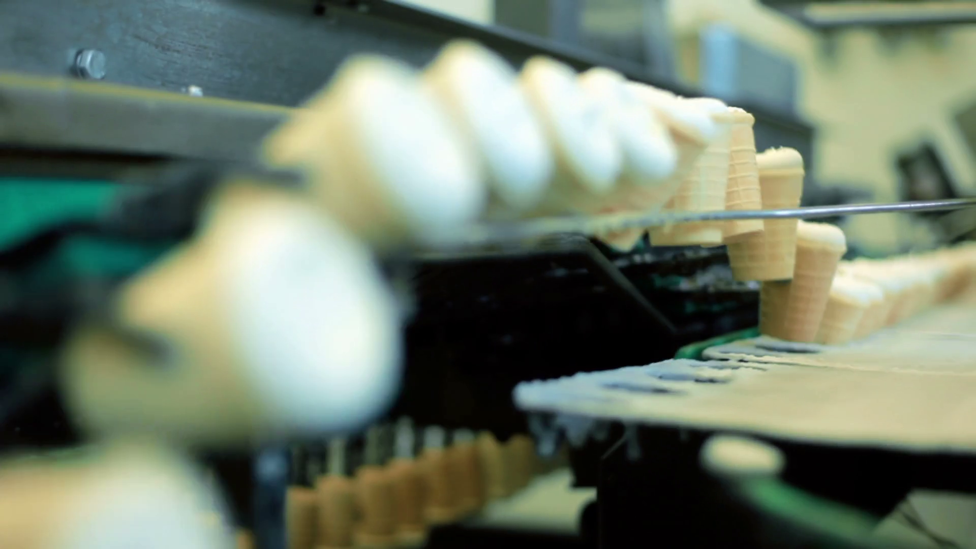 Ice cream production line. Row of ice cream on conveyor line. Food