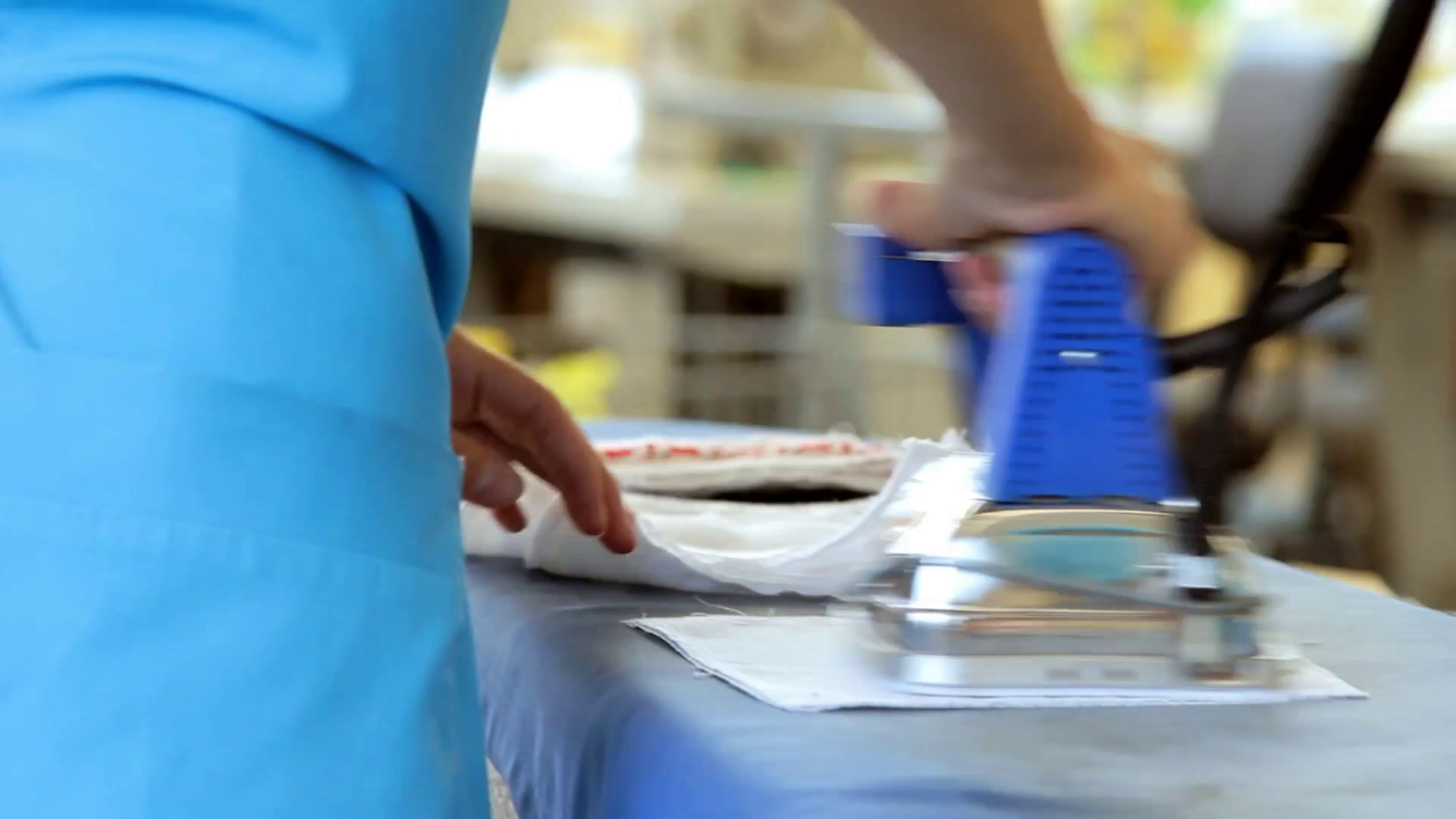 Ironing Clothes At Factory Closeup Female Stock Footage SBV320311670