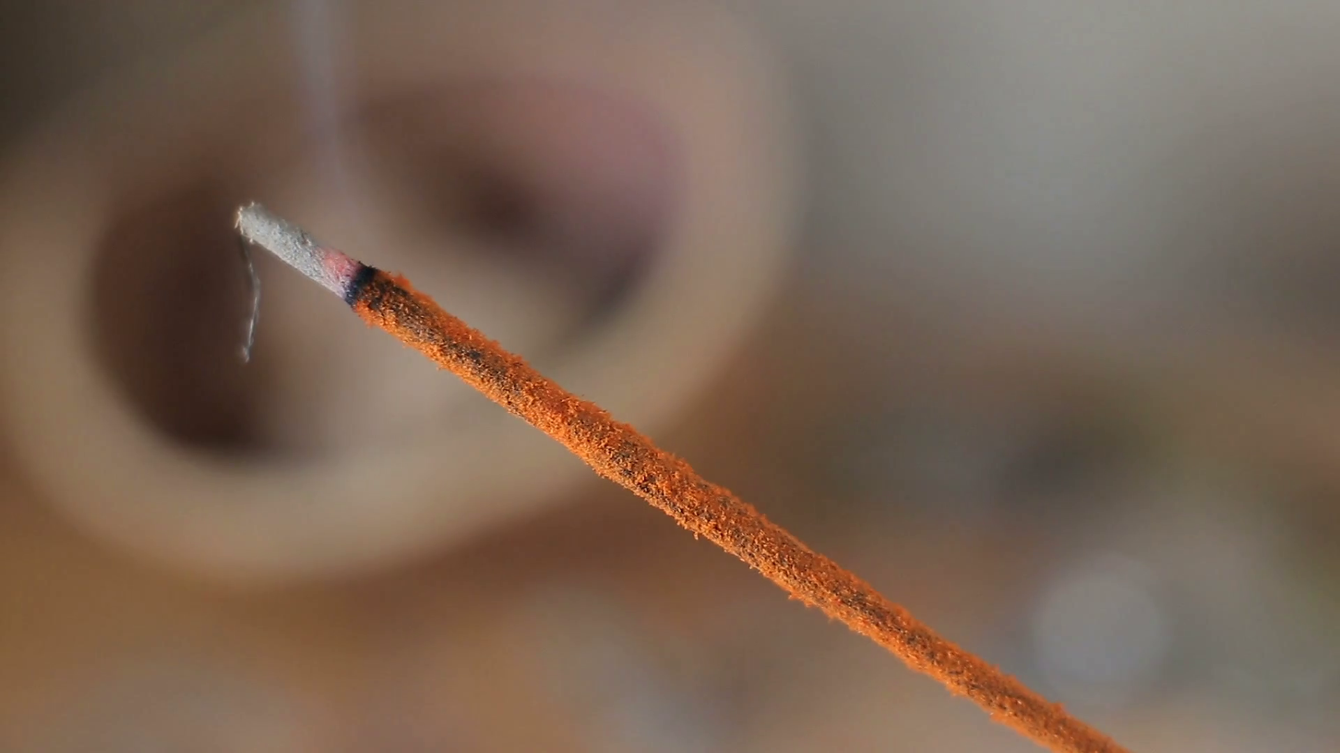 Incense stick burning in the home interior Stock Video Footage 0018