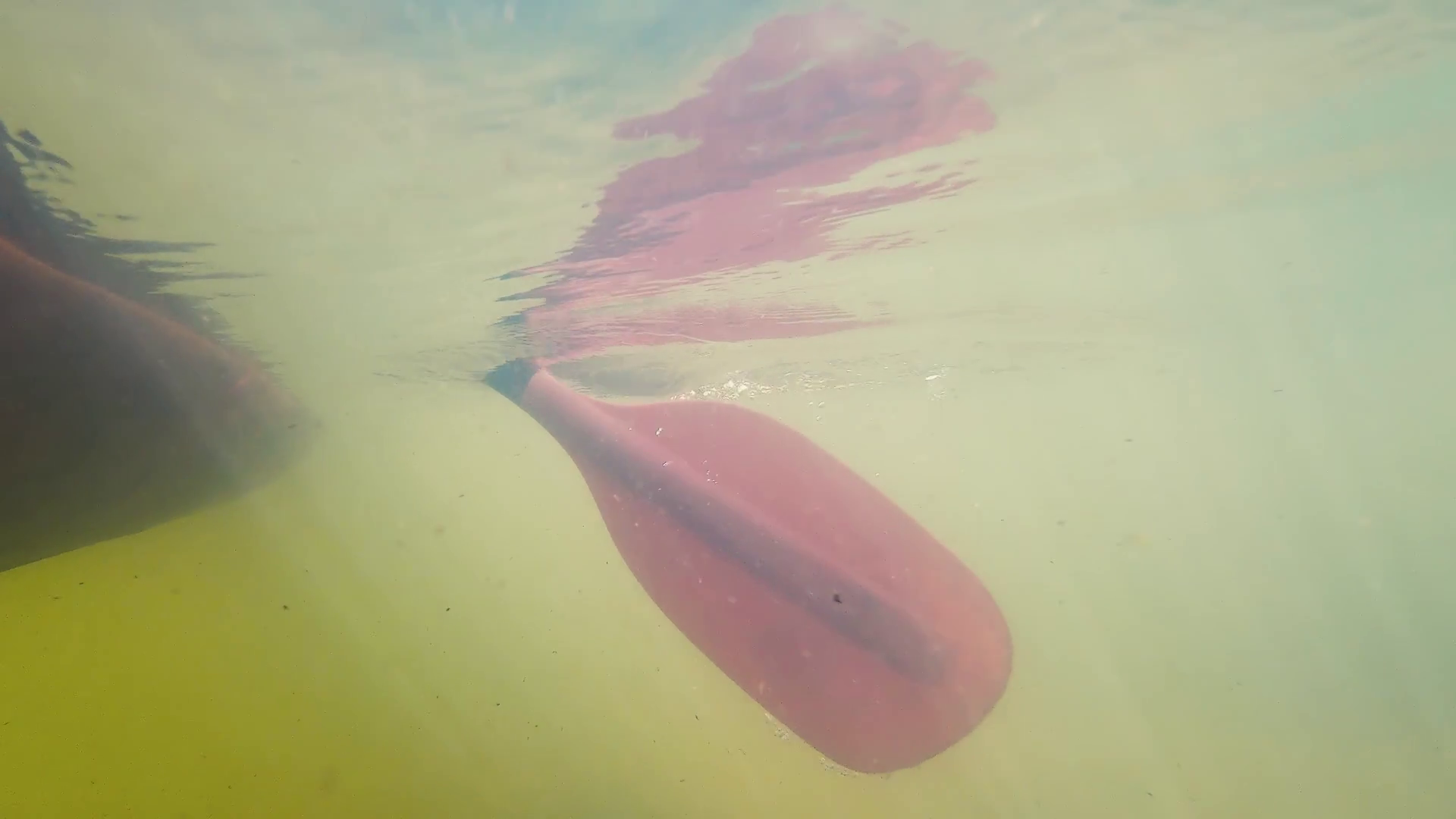 Underwater View Of Canoe Paddling Along River Stock Footage SBV