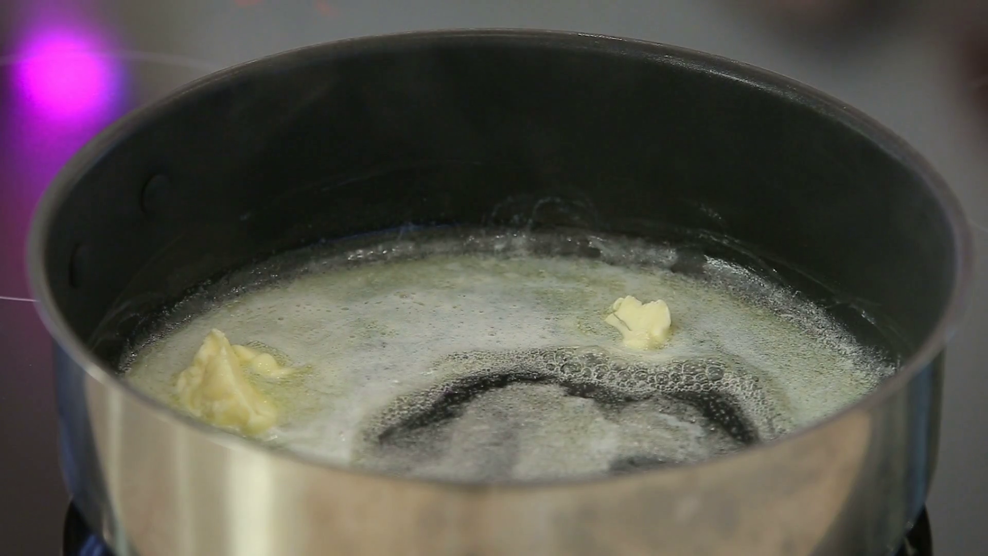 Heating butter in a saucepan Stock Video Footage 0007 SBV321446757 Storyblocks