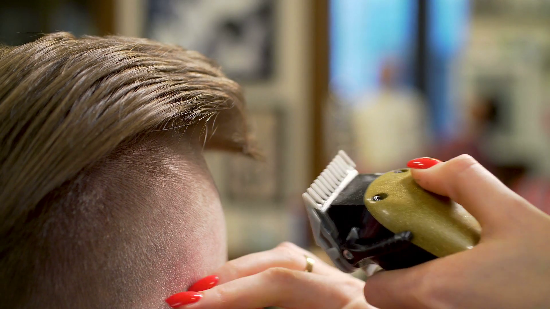 Young man getting haircut Stock Video Footage 0021 SBV332828360