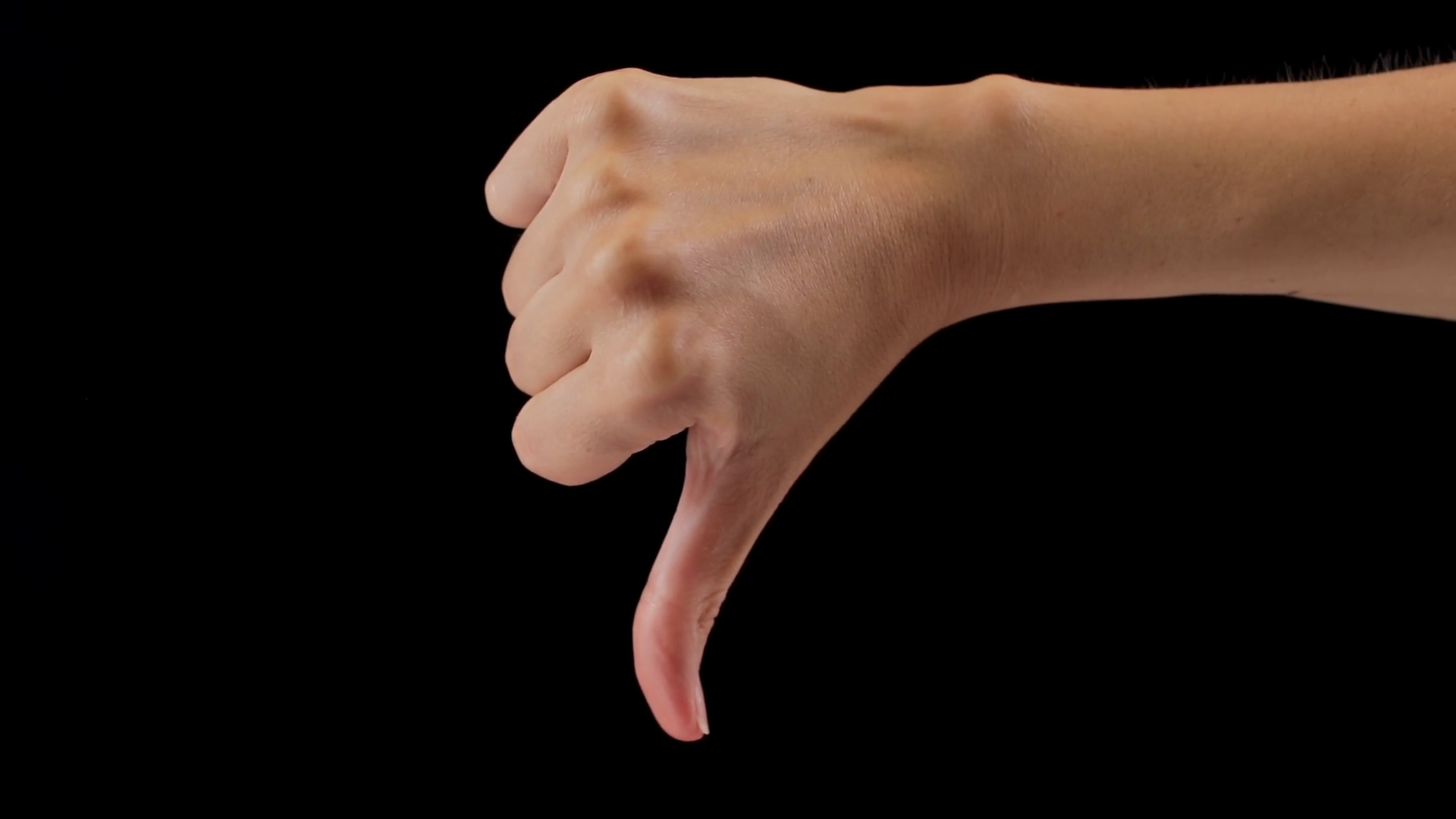 Female Hand Showing Thumbs Down On Black Stock Footage SBV-338838977