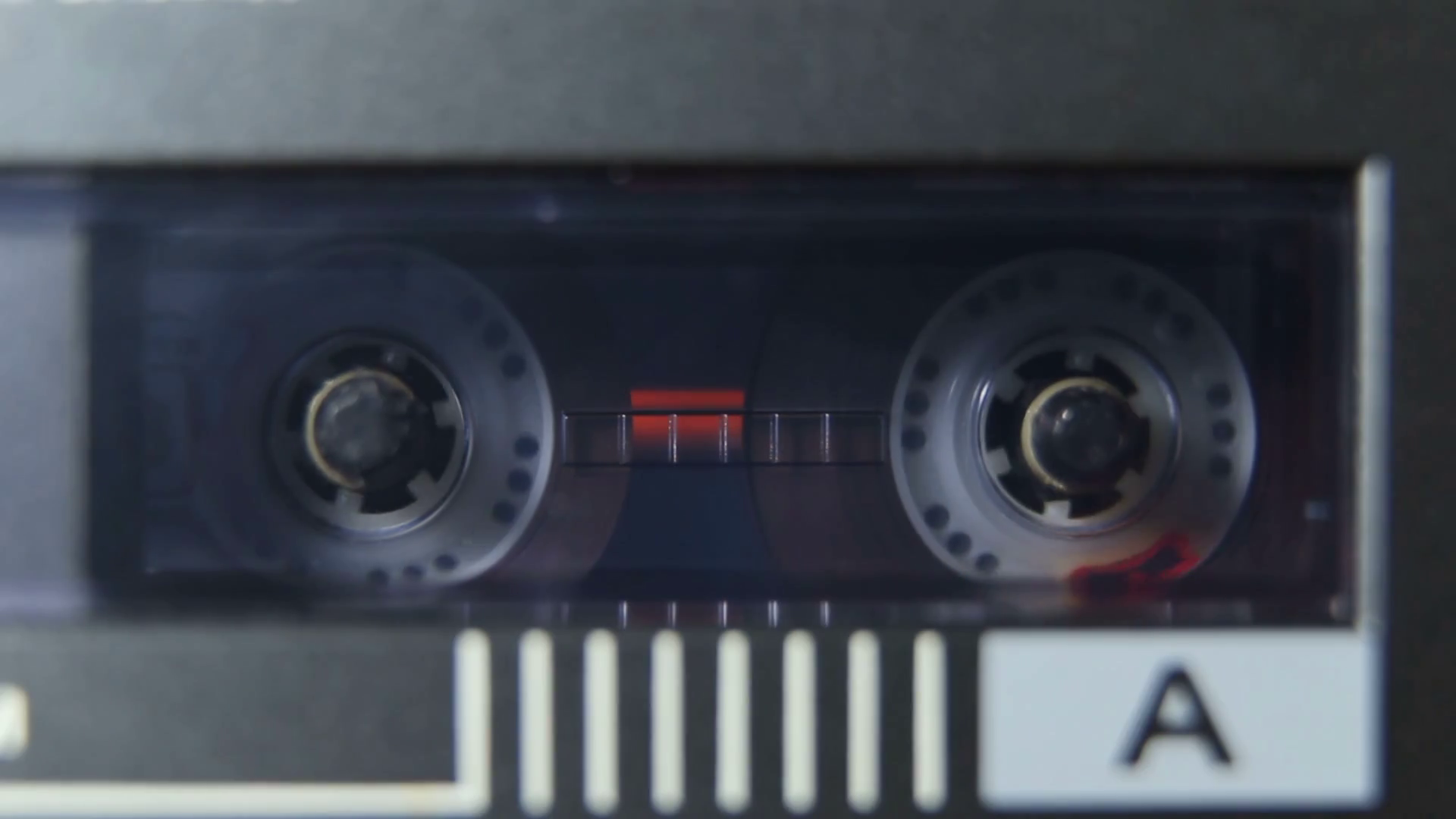 Rotating Reels Of Cassette In Player Stock Footage SBV338647696