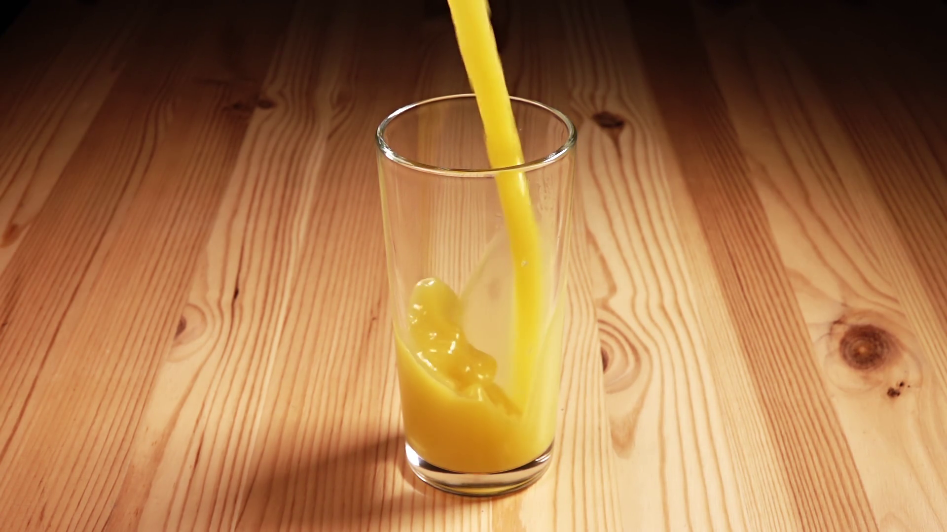 Juice Poured Into Glass With Splashes Slow Stock Footage SBV338378558