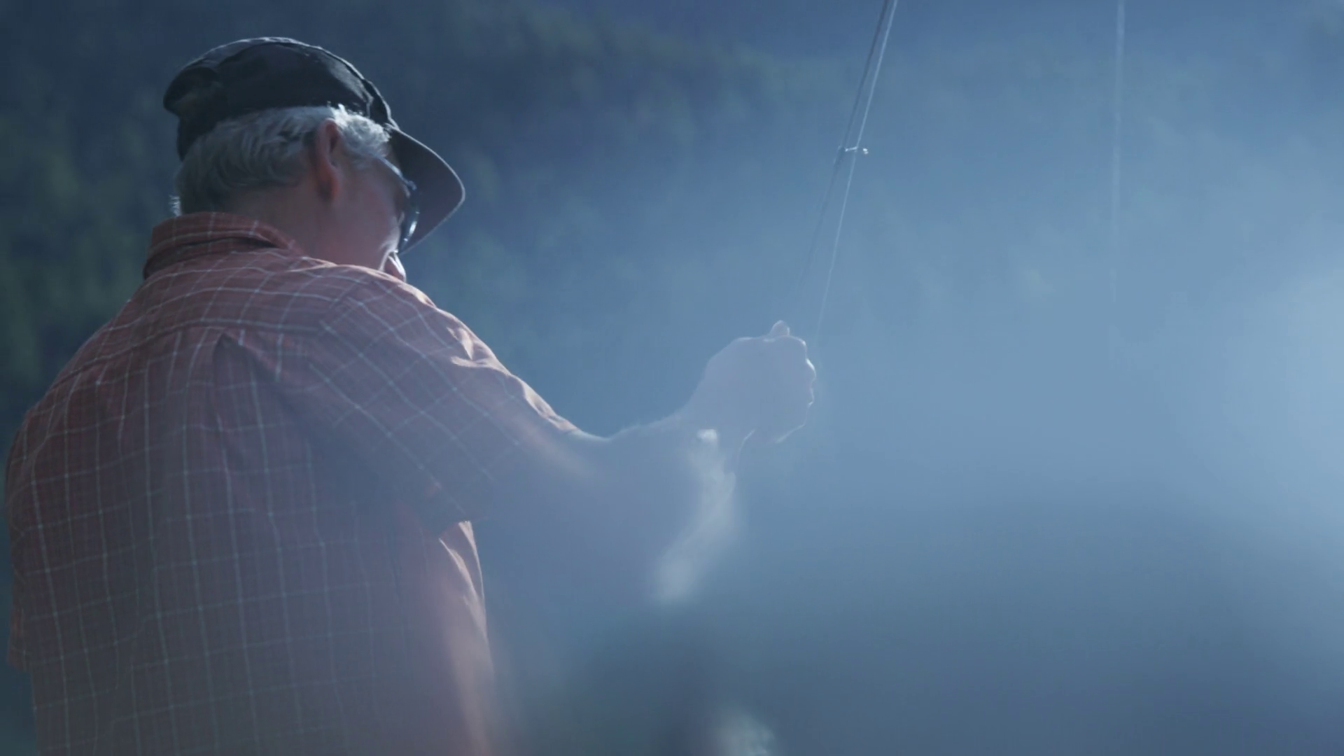 Man Reeling In Fishing Line Fishing Stock Footage SBV305107845