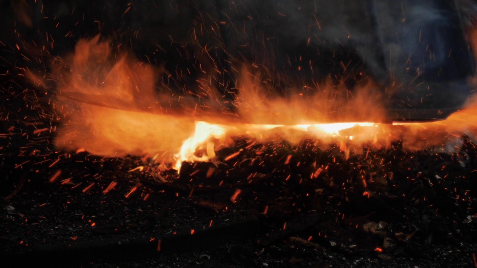 Close Up Of Sheet Of Metal Being Heated In Stock Footage SBV332470962