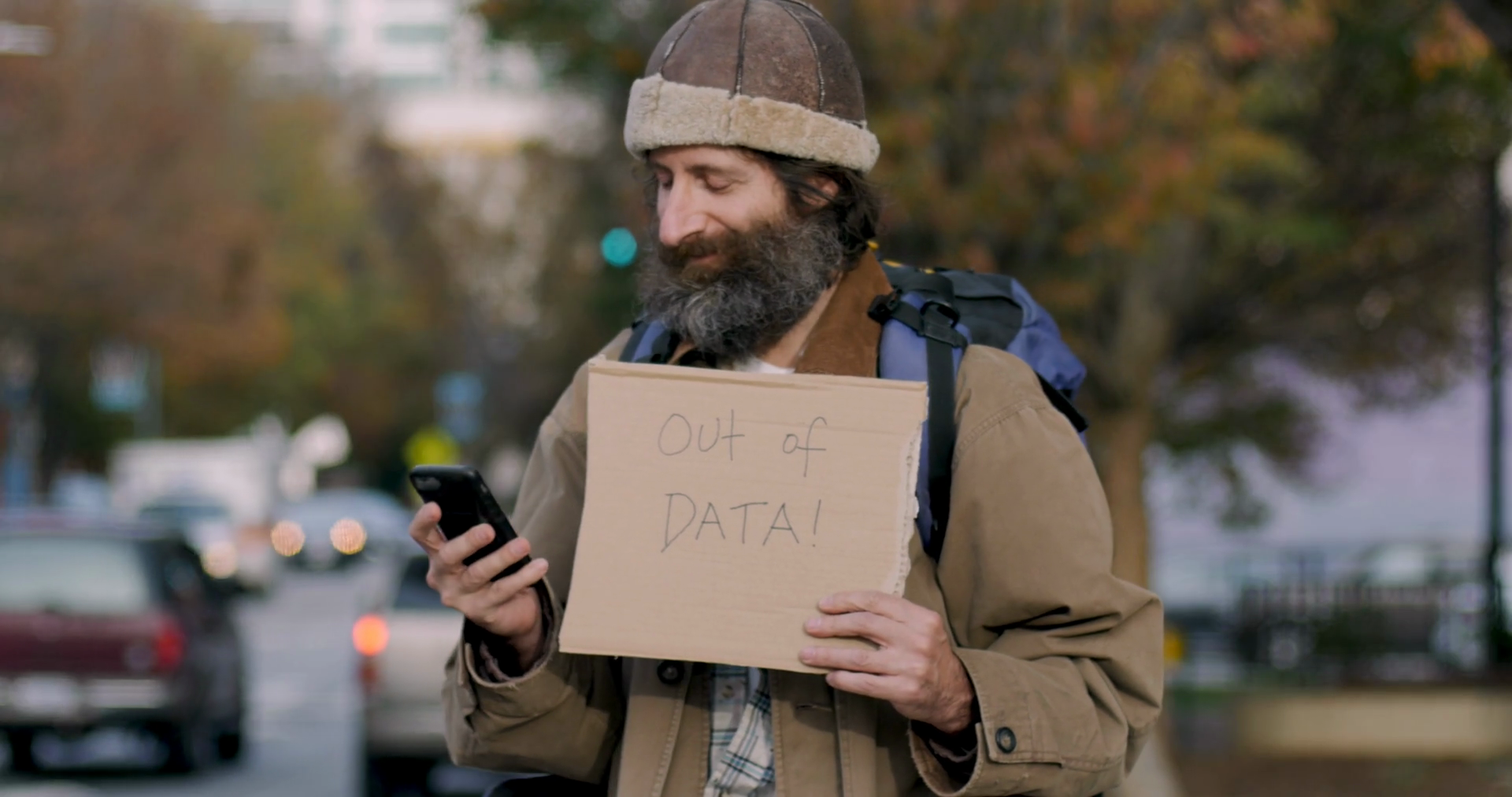 Portrait Of A Homeless Man With A Sign That Says Out Of Data Holding A Smart Phone As If Running Out Of Data Caused His Homelessness Stock Video Footage Storyblocks