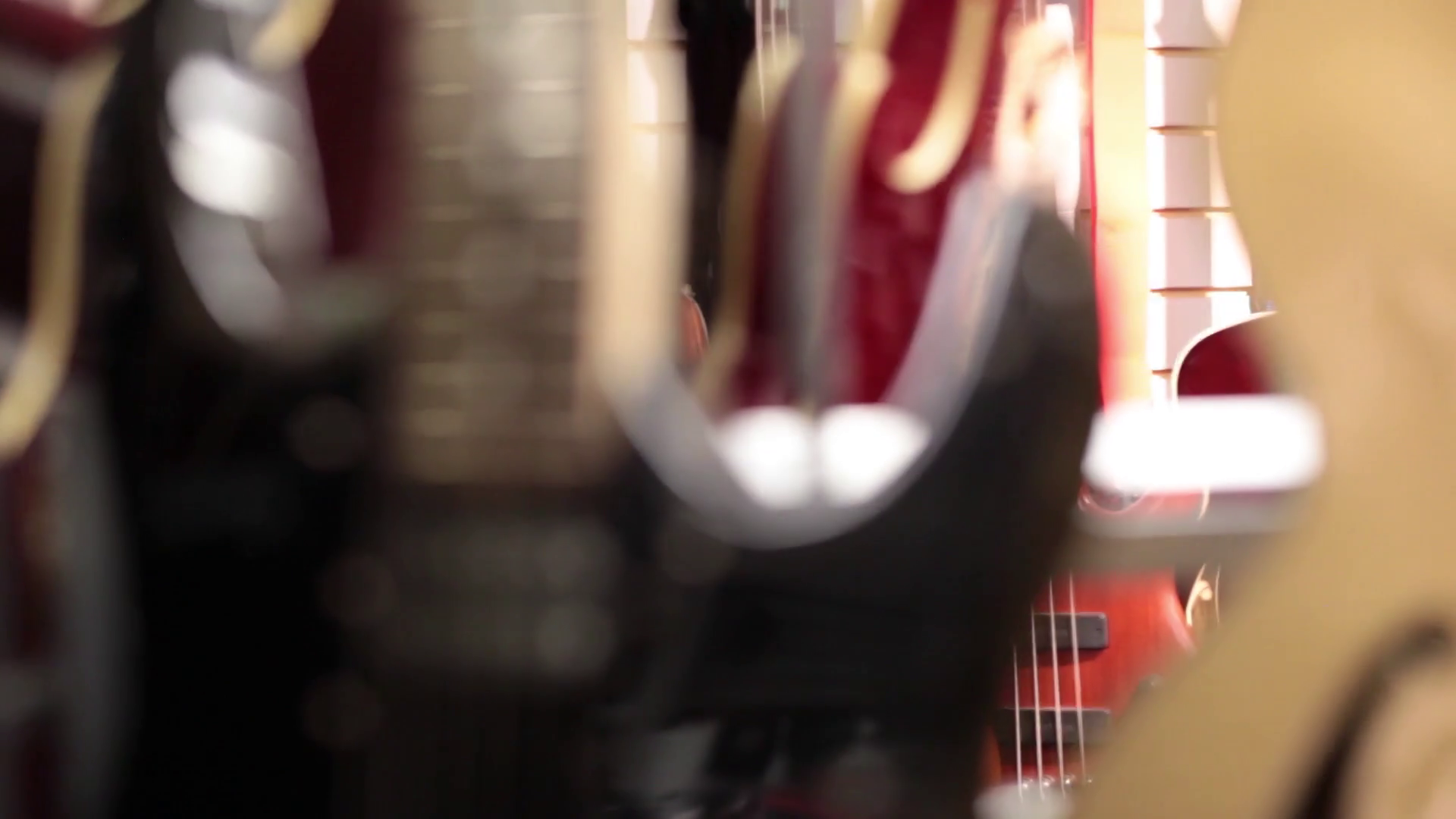 Close Up Cu Electric Guitar Static Rack Focus Stock Footage SBV