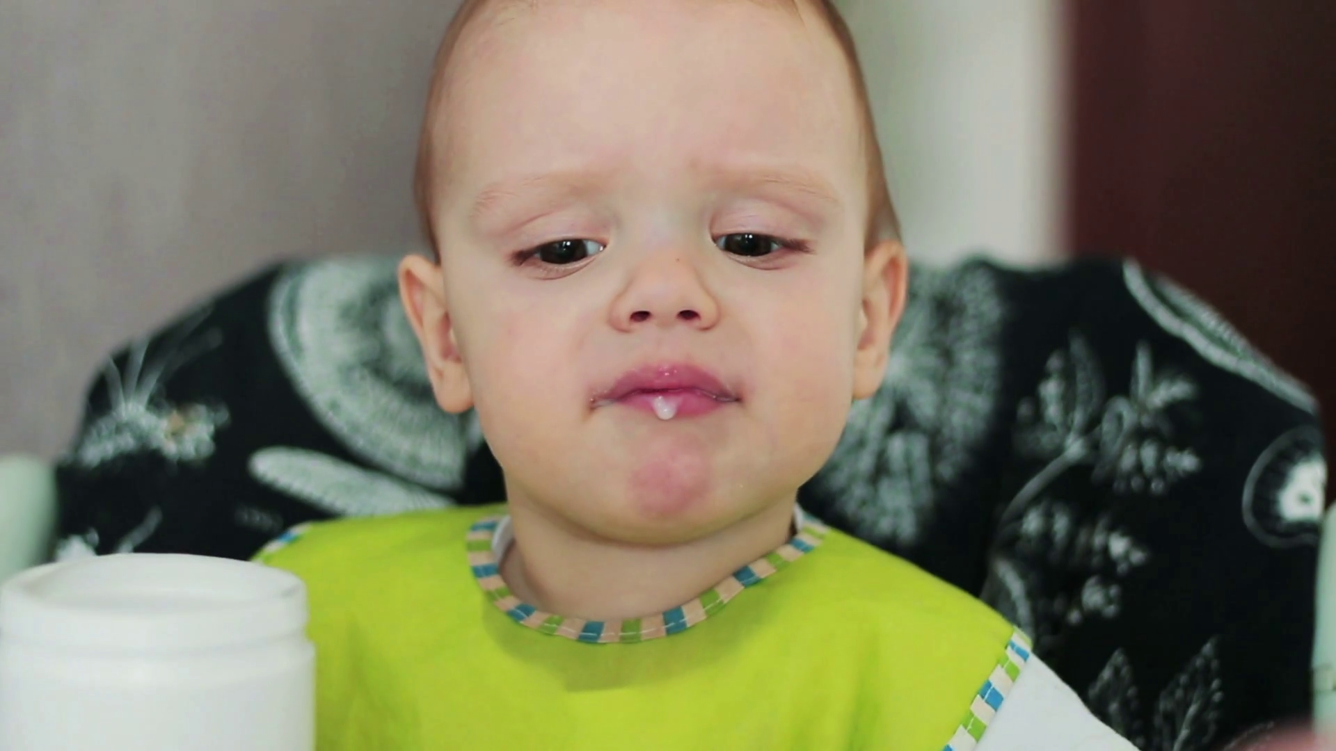 A little baby boy refuses to eat nutrition Stock Video Footage 0020