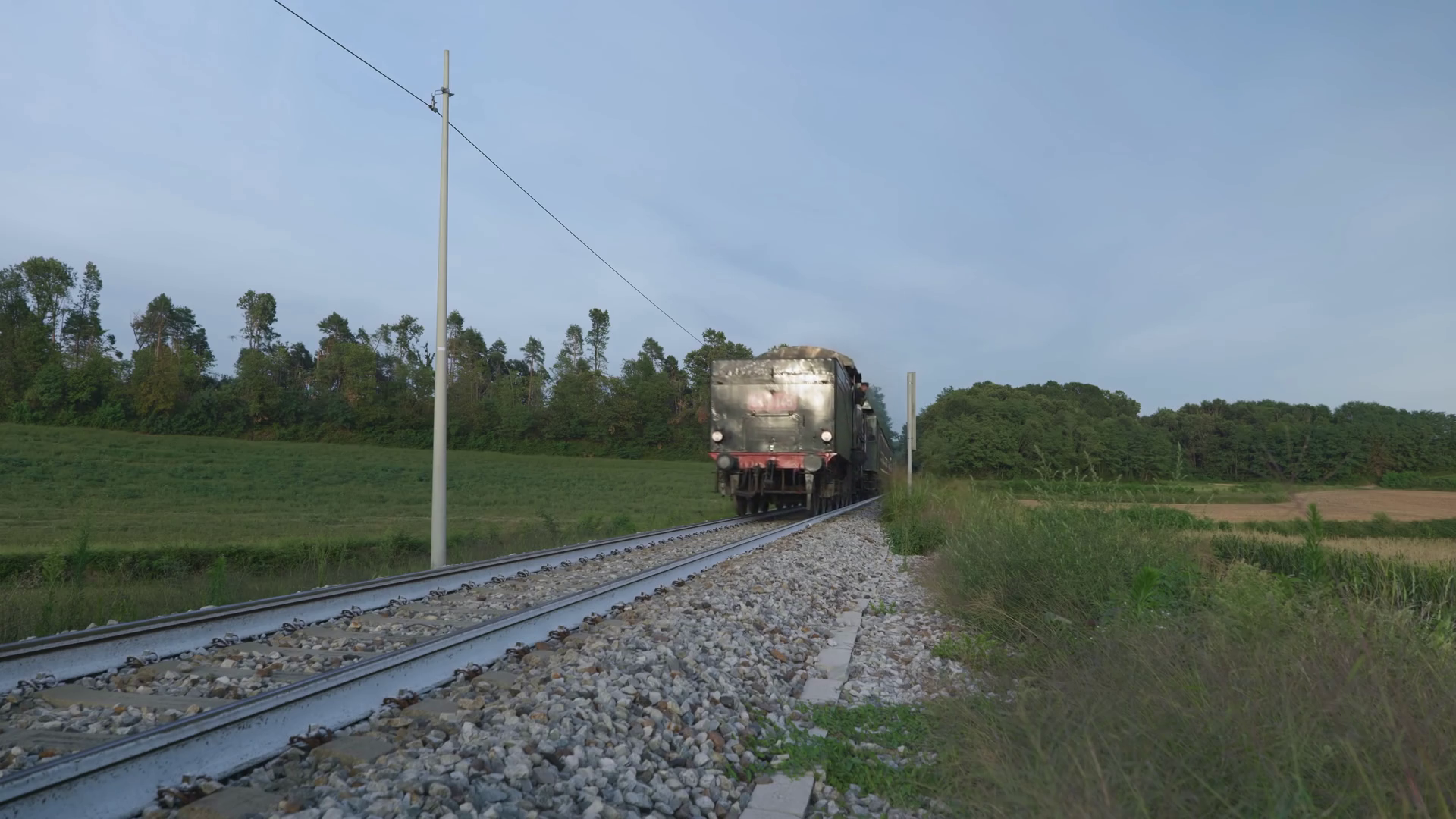 An Old Steam Locomotive Pulling Passenger Stock Footage SBV-348537447 ...