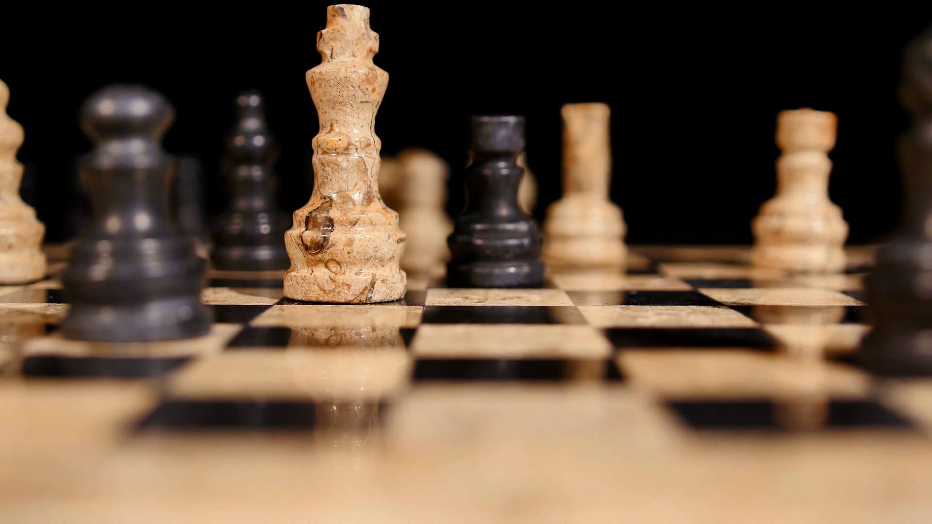 A black attacks the white king, hits him and throws him down