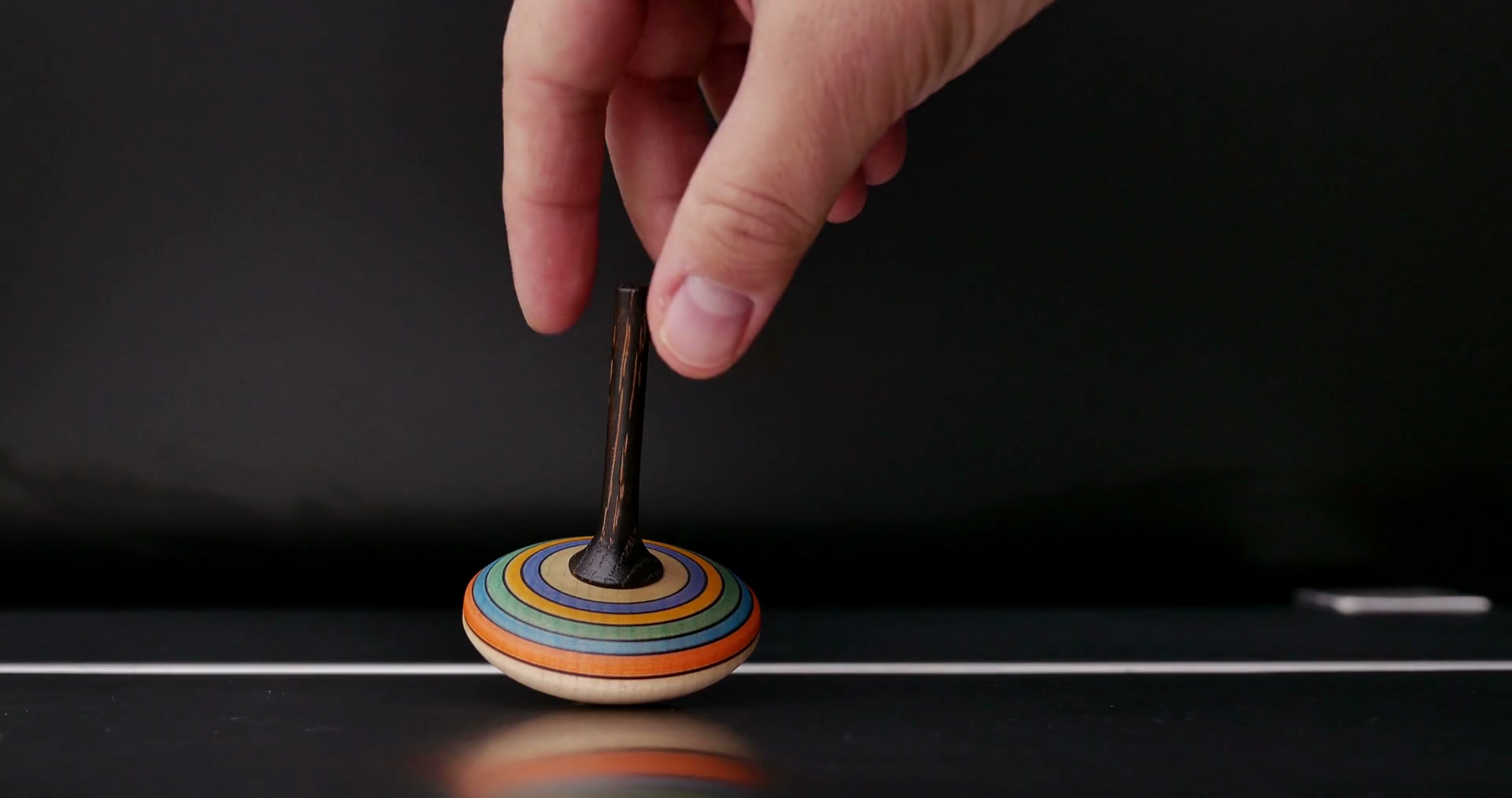 A Spinning Top Being Spinned Human Hand Stock Footage SBV304346993