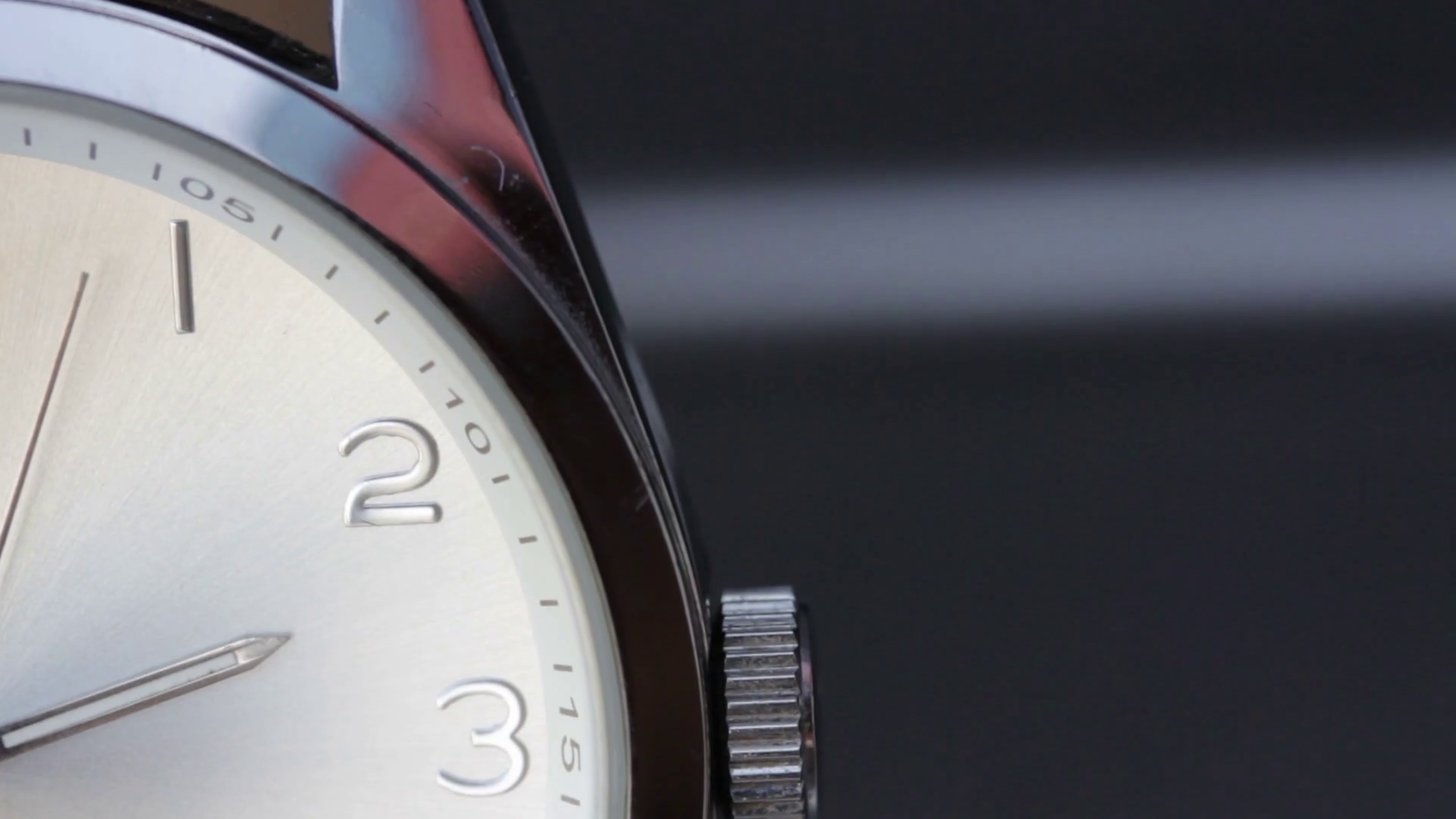 Close up shot of a clock and its seconds hand the shot moves from up