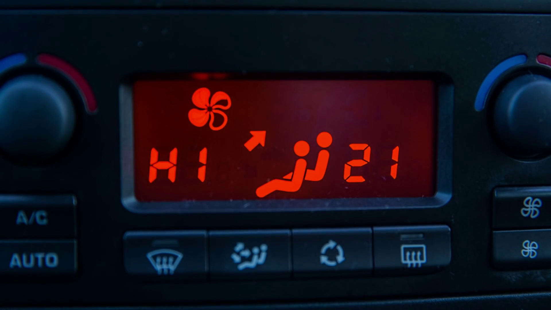 Front shot of high temperature value in car. Static shot of car