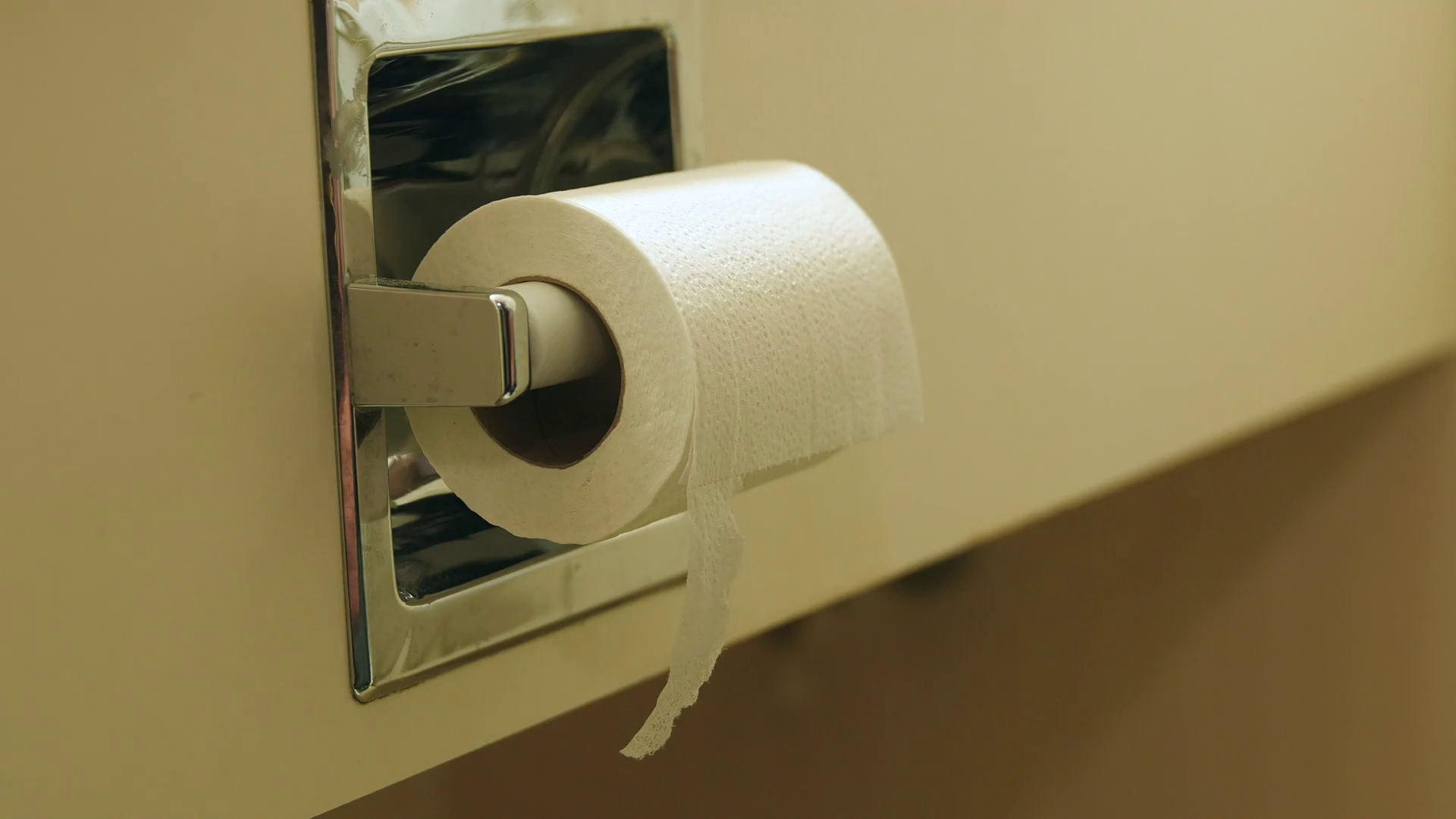 A Man Grabs Toilet Paper Using Bathroom In Stock Footage SBV306754349