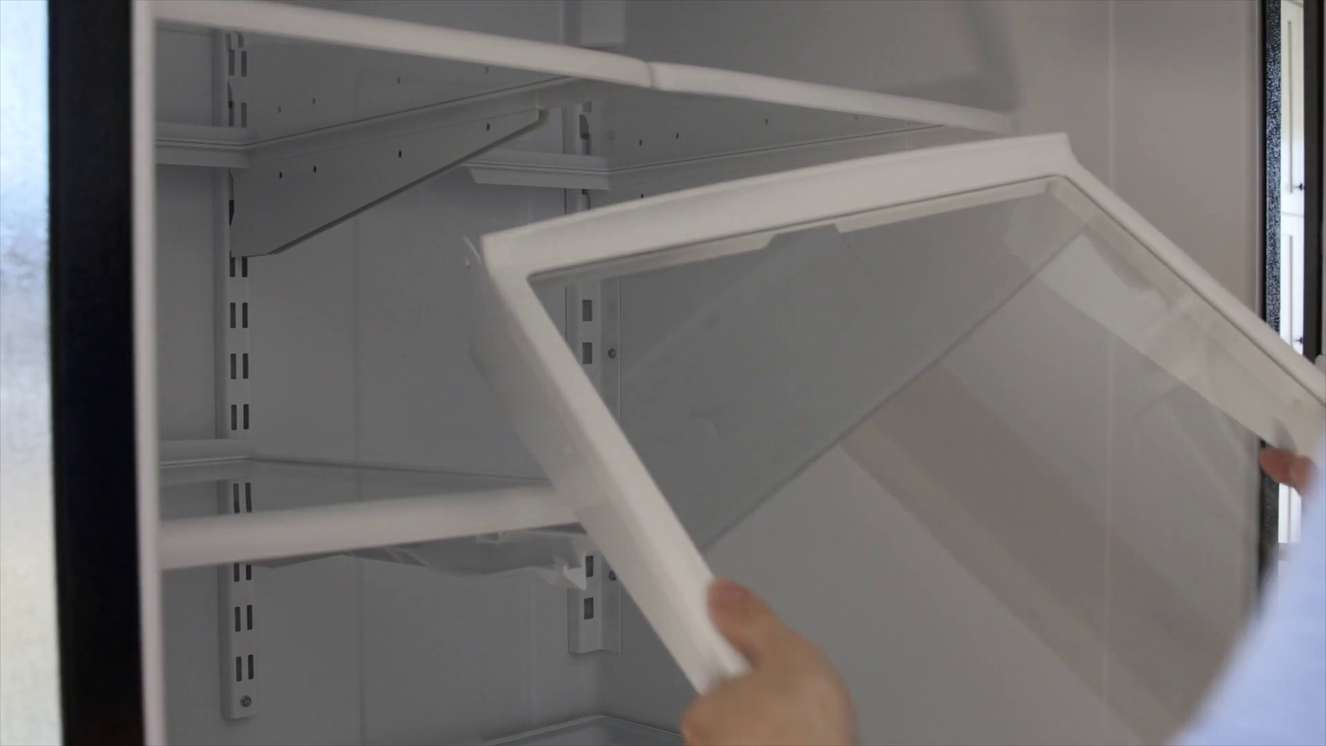 Woman Putting Fridge Shelf Back In Cleaning Stock Footage SBV301043620